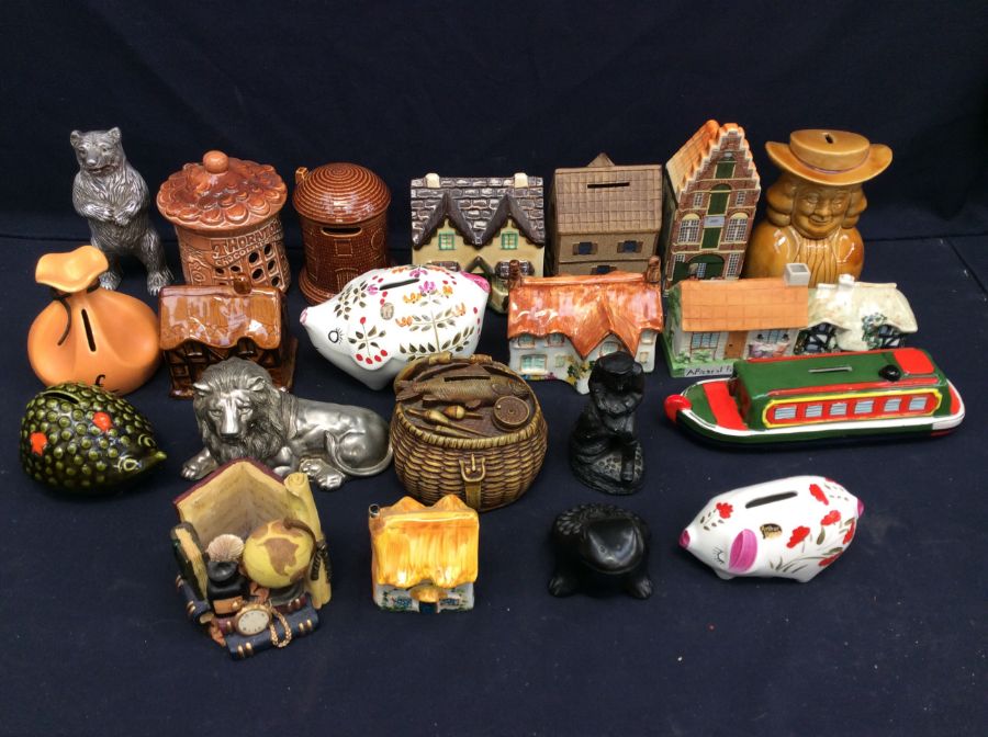 A collection of mixed 20th century money boxes