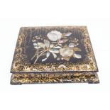 A 19th Century black lacquered trinket box with mother of pearl and gilt detail