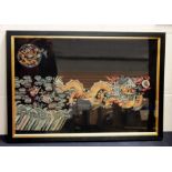 A framed embroidered panel with an oriental Chinese design.
