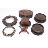 A collection of wooden Chinese stands, 19th Century and early 20th Century along with lacquered