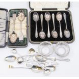 A collection of silver to include; a cased set of ornately engraved berry spoons, Dublin, 1827,