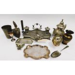 A collection of mostly silver plated items, including bowls, candlesticks, tea set items and
