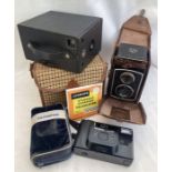 Cameras: Rolleicord Model Ia F&H twin lens in case, Ensign box camera in case and Olympus in case.