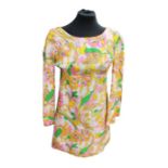A floral 1960s Dollyrocker dress by Sambo in a colour way of pink yellow and green. The long