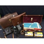 A collector's lot containing a Masonic case and items including binoculars, leather hand cases,