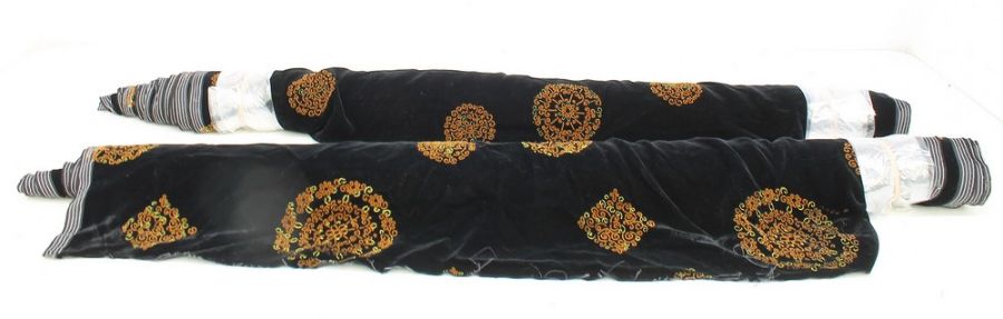 Two part-rolls of black velvet with a brown lace motif; 2 bolts on card of white Nottingham lace;