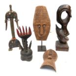 Nigerian tribal piece, 42.5cm high; Mozambique mask, 46cm; other tourist ware (5)