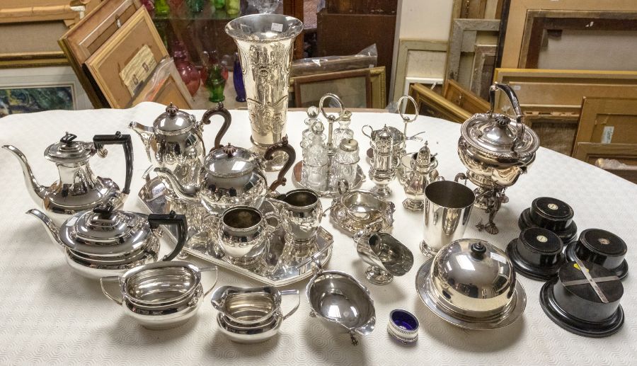 A collection of silver plate to include: a Celtic Revival style four piece tea and coffee service