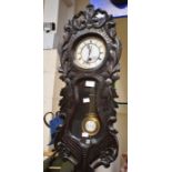 19th century stained pine German 8-day wall clock - with Black Forest-style carved front
