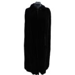 A late 1960s black velvet Cape bearing the label  QUAD -  which had a boutique in London and sold