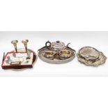 A collection of silver plated items to include; A tea set consisting of tea pot, sugar bowl and milk