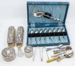 An Edwardian four piece Birmingham silver mounted dressing table set, along with plated flatware (
