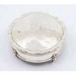 A George V silver trinket box with fabric innards and leather underneath, with four feet and