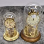 Two mid 20th century German anniversary clocks in domes