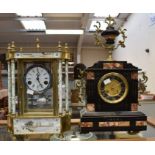 A 19th century French brass mantel clock, together with a French 19th century black slate mantel