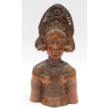 A Far Eastern hardwood head and torso of a deity