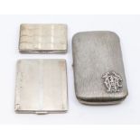 A collection of German silver to include; a large textured 'bark' like designed 800 standard cigar