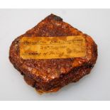 Royal novelty interest: A varnished currant bun bearing paper label 'Abingdon Bun Throwing, 29th