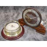 A stylised wooden Smith's mantle clock along with a Metamec England wood and brass barometer