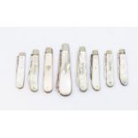 A collection of silver bladed pocket knives/fruit knives: All with mother of pearl decoration,