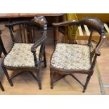 A pair of Edwardian corner chairs in mahogany, together with an Edwardian mahogany armchair