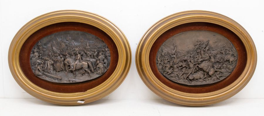 After Justin Mathieu, a pair of late 19th Century copper alloy plaques depicting battle scenes