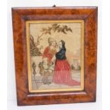 A 19th century framed wool work tapestry of a man and women
