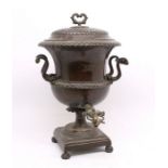 A large Copper Samovar with stylised decoration and stature, bird head handles. Brass spout to