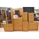 Contemporary teak bedroom suite, i.e. two mirrored wardrobes, a lowboy small dressing table, two