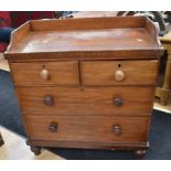 A mid-Victorian galleried washstand chest of drawers, together with a Continental three-part
