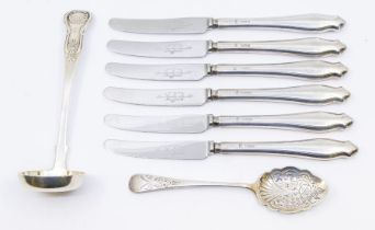 A collection of silver to include; A Victorian Scottish silver ladle with shell designed handle,
