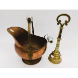 A Gothic style brass door stopper with weight to base along with a copper and brass coal scuttle