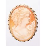 A 20th century 9ct gold mounted cameo brooch, depicting a female bust, double rope edge border, size