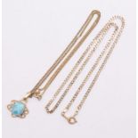 A 9ct gold and Larimar pendant, comprising an oval cabochon larimar within a fancy 9ct gold wirework