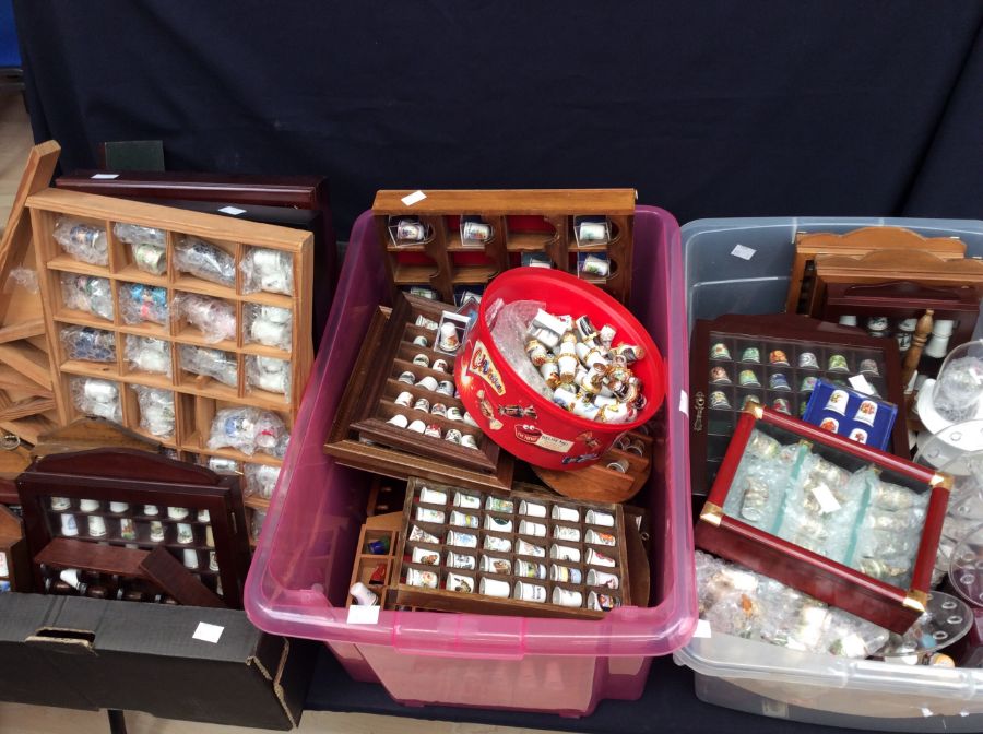 Large collection of mixed collectors' thimbles along with display trays, stands etc.