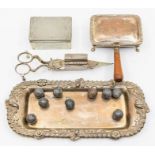 A collection of plate to include candle snuffer scissors, snuffer tray, toilet box with stone balls,