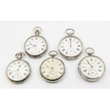 A collection of five late 19th early 20th century silver open faced pocket watches, all with white