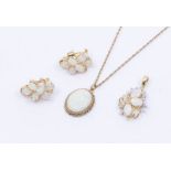 A collection of opal set jewellery to include an opal 9ct gold pendant, set with oval opal within