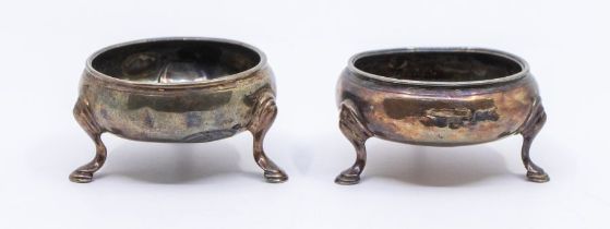 A pair of George III silver salts with three feet and plain design, hallmarks to bases, London Circa