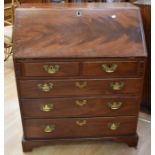 George III mahogany bureau and oak tilt top table