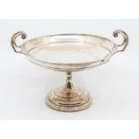 A George V silver plain two handled comport, with stylised classical handles, hallmarked