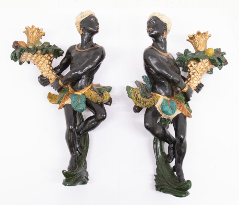 A pair of modern reproduction decorative Blackamoor wall hangings