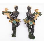 A pair of modern reproduction decorative Blackamoor wall hangings