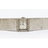 A vintage Girard Perregaux 18ct white gold ladies wristwatch, comprising a signed silver rectangular