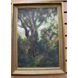 A framed Southern Comfort modern mirror, together with an early 20th century oil on board of a tree,