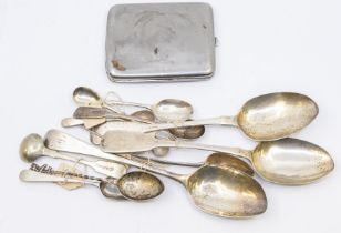 A collection of silver spoons to include; Three silver serving spoons: A pair of Victorian fiddle