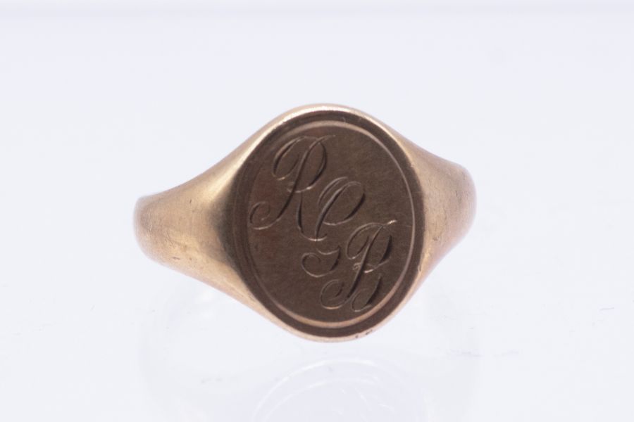 A 9ct gold oval signet ring, inscribed with the initials, R.G.B, size P1/2, weight approx 5.3gms