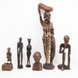 A collection of mid-20th century carved African figures