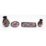 Moorcroft pottery - a quantity of 4 pieces of aneome items.