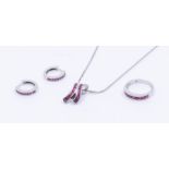 A collection of ruby and 18ct white gold jewellery to include a ruby set half eternity ring,